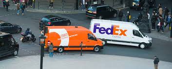 TNT and FedEx courier vans